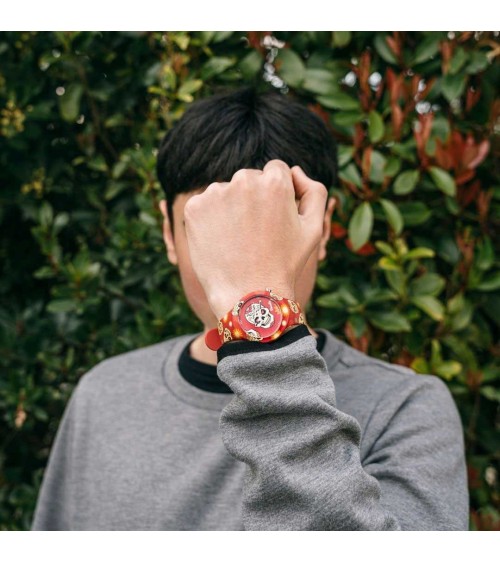 Reloj Doodle rojo calaveras