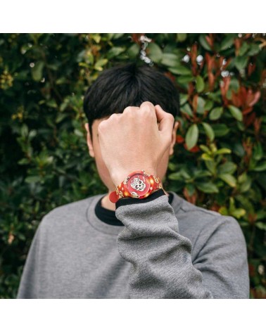 Reloj Doodle rojo calaveras