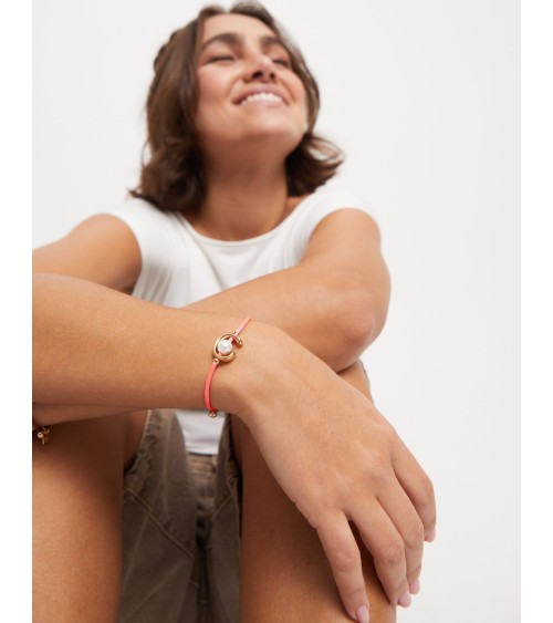 Pulsera fucsia con perla shell bañada en oro 18k | UNOde50