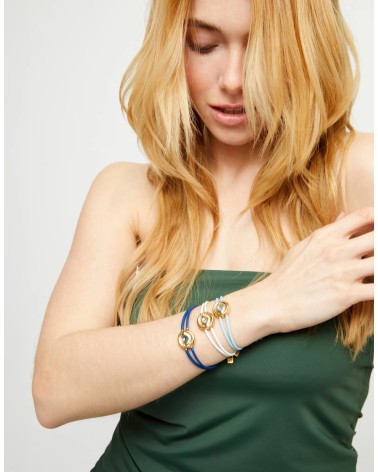 Pulsera UNOde50 PUL2601AZCORO doble cuero azul con ojo dorado y cristal